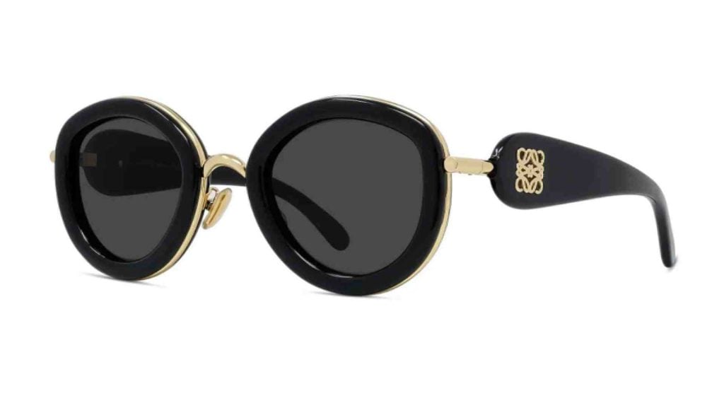 Loewe Anagram LW40130U sunglasses, which feature heavy rounded black frames with delicate gold detailing