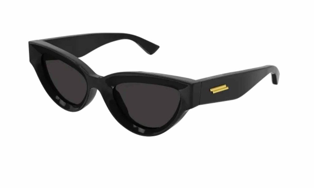 Thick black-framed Bottega Veneta BV1249S cat-eye sunglasses with grey-tinted lenses