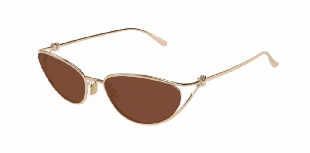 Delicate gold metal-framed Bottega Veneta BV1330S sunglasses in gold with brown tinted lenses
