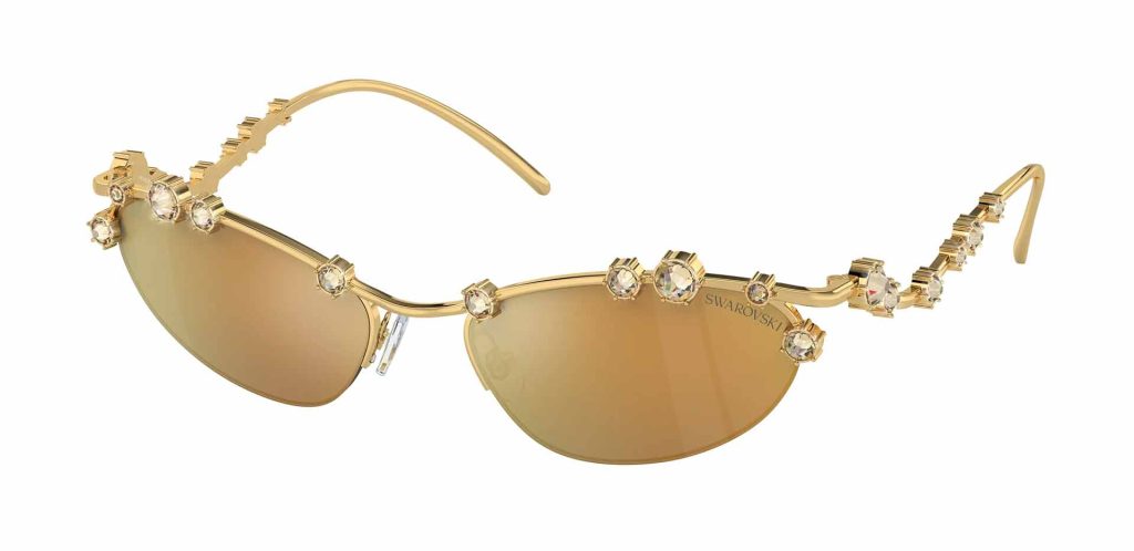 Gold-framed, cat-eye Swarovski SK7016 sunglasses featuring floral detailing