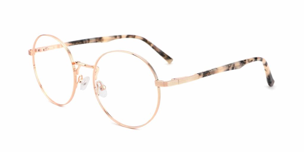 Sliik 23083 delicate metal-framed round glasses in Rose Gold with tortoiseshell detailing on the arms