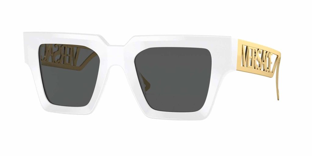 Versace VE4431 sunglasses featuring white frames, grey lenses, and bold gold logo detailing 